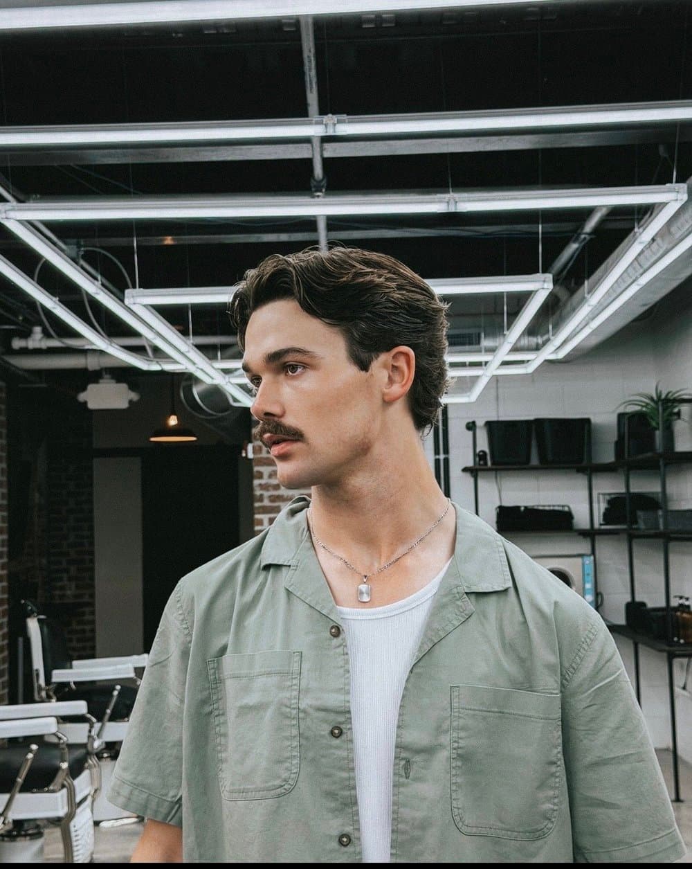 A finished hairstyle photographed inside Star Barber Company